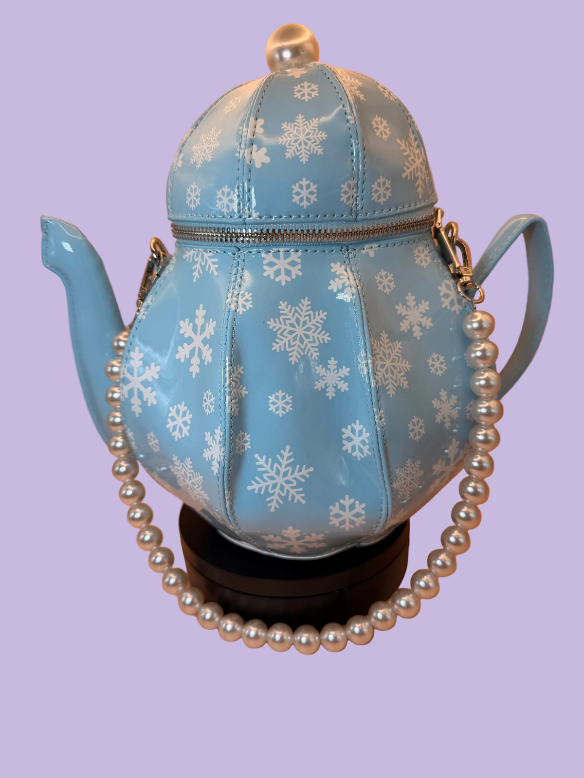 teapot bag blue with white snowflakes and pearl handle